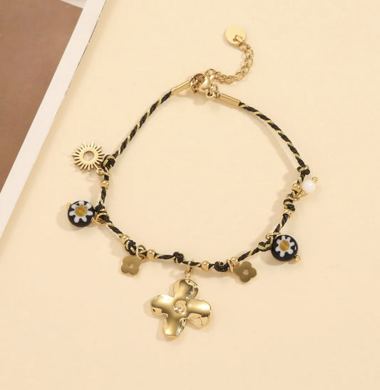 Bracelet Doré Fil Noir Et Doré Avec Multi Breloques Fleurs Et Soleil