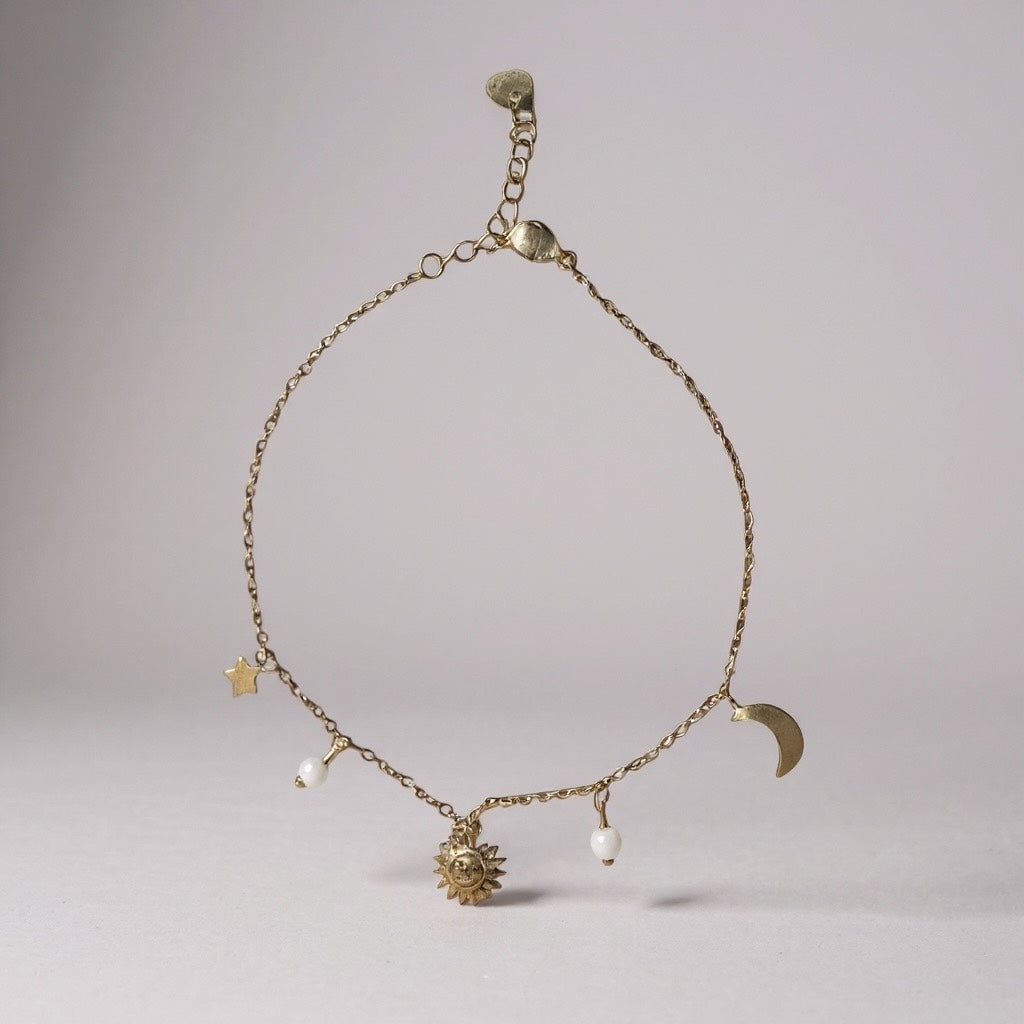 Chaîne de cheville dorée avec pendentifs ☀️