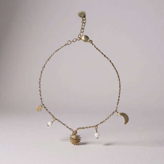 Chaîne de cheville dorée avec pendentifs ☀️