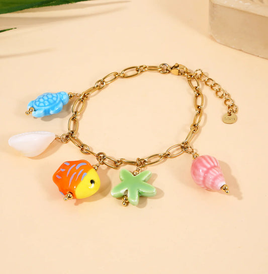 Bracelet Chaîne Dorée Charms Océaniques en Céramique