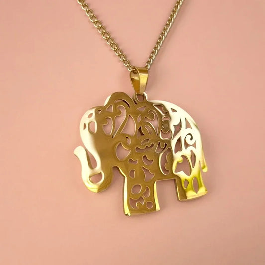 Collier doré gros pendentif éléphant